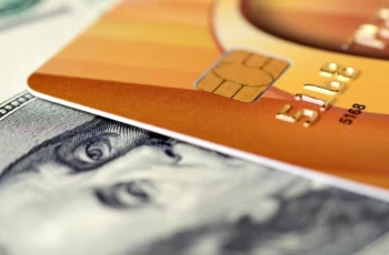 is it better to pay with cash or a credit card