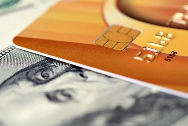 is it better to pay with cash or a credit card