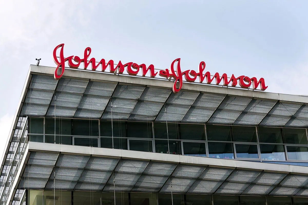 a johnson and johnson sign on the roof of a building.