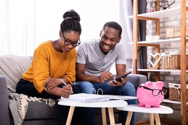 millennials couple sofa finance savings