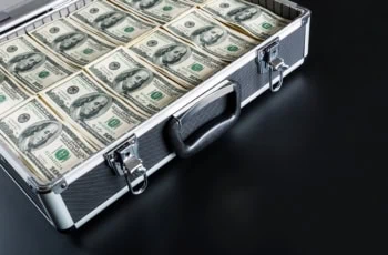 a briefcase full of hundred dollar bills.