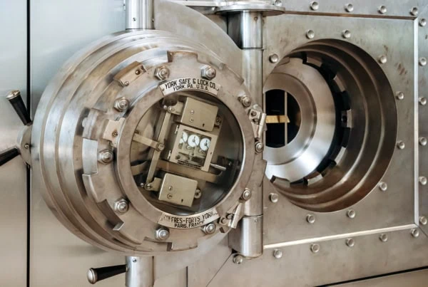 a large bank vault door in a bank in lisbon portugal.