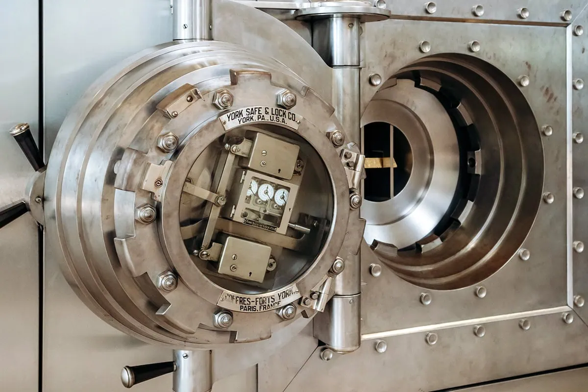 These 7 mutual funds keep it simple, smart 7 a large bank vault door in a bank in lisbon portugal.