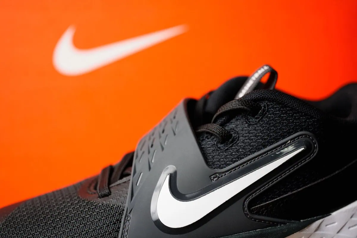 2026's Massive Job Cuts: 10 Well-Known Companies That Laid Off a High Number of Employees 3 nike swoosh brand sneakers layoff