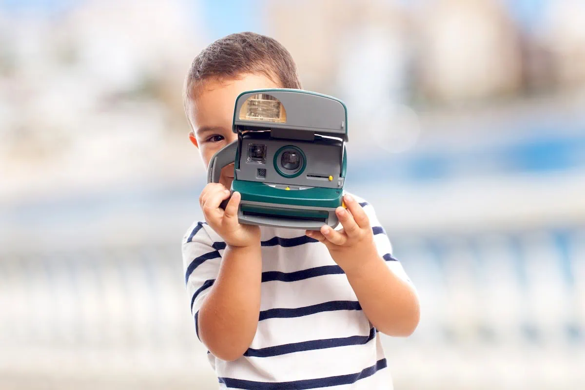 old technology instant camera kid 1200