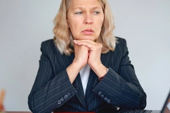 Portrait of worried woman at office