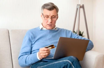 online fraud senior laptop credit card