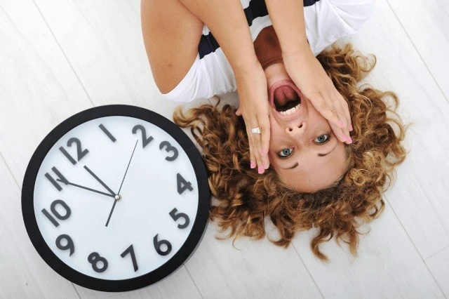 panic woman upside down clock deadline