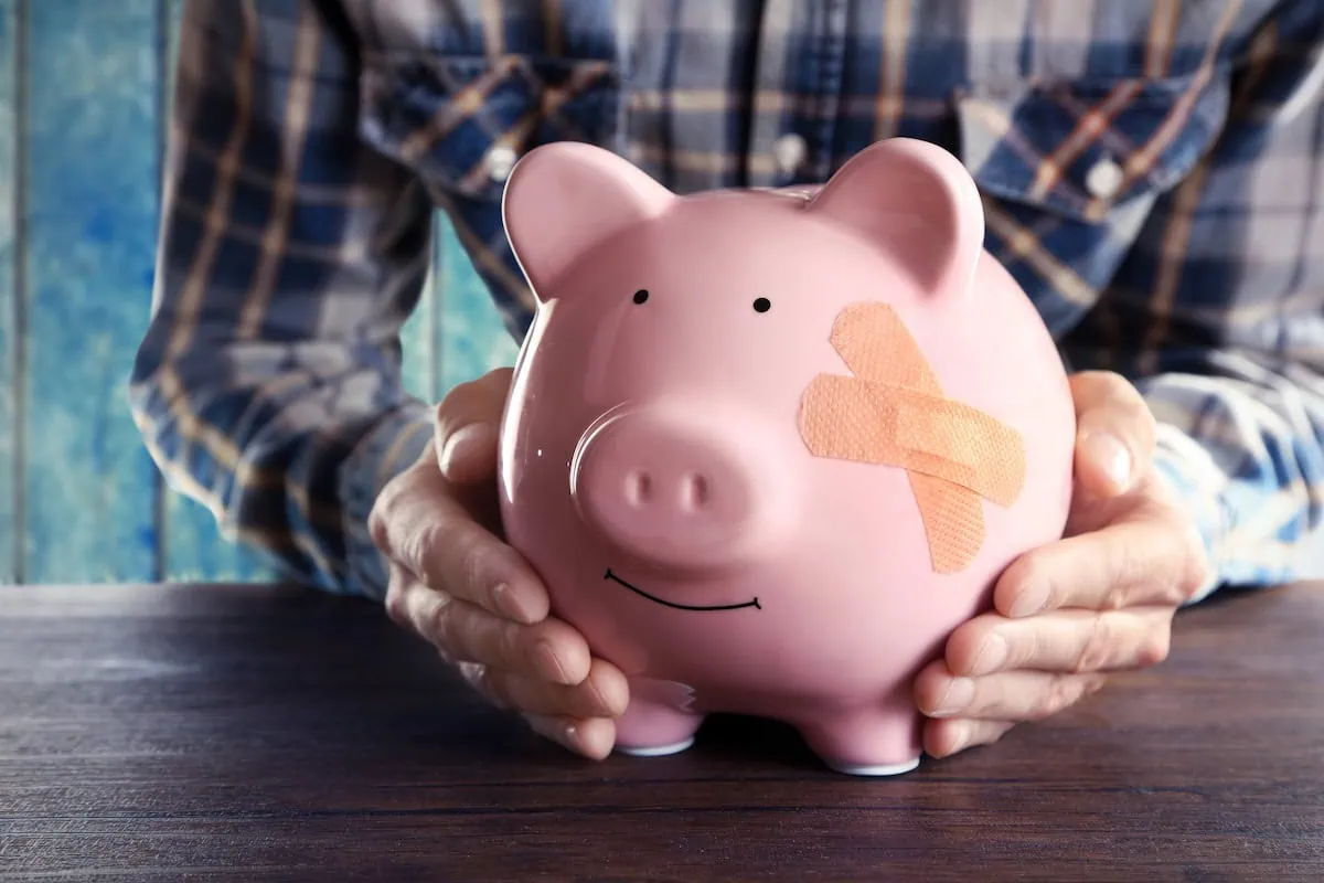 piggy bank injured bandage wasting wealth 1200