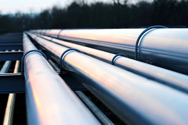3 Best Energy ETFs for Beginners 4 a long silver oil pipeline.