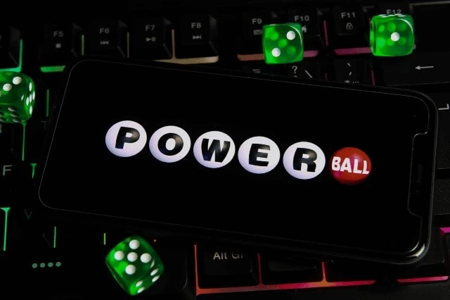 powerball on phone screen with dice