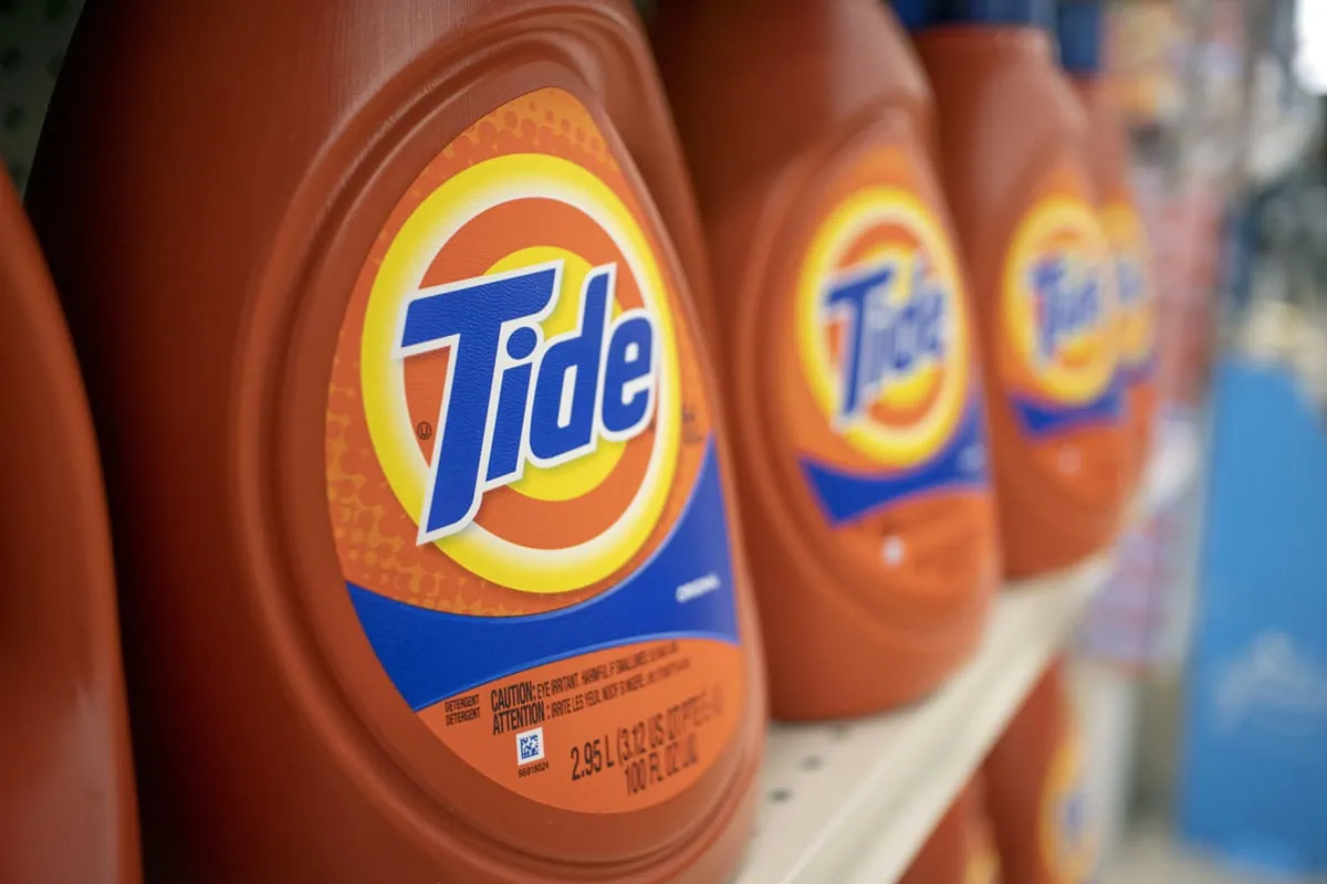 Tide laundry detergent on a grocery store shelf.