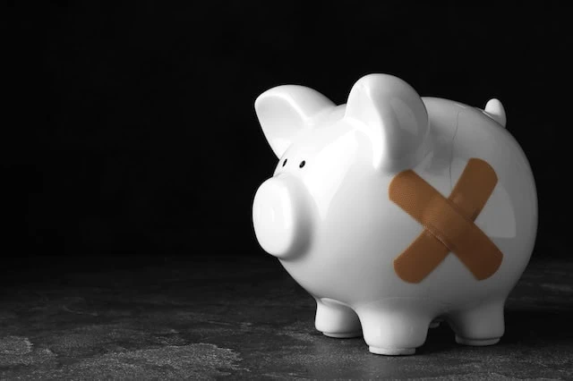 retirement 401k cracked piggy bank bandaid 640