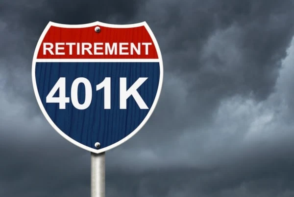 retirement road sign gloomy clouds 401k 1200