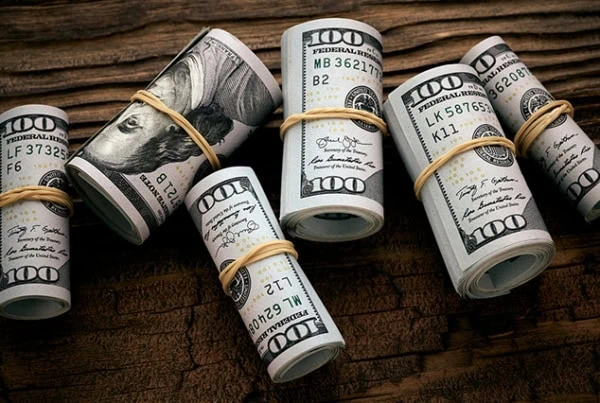 rolled cash dollars money dividends small