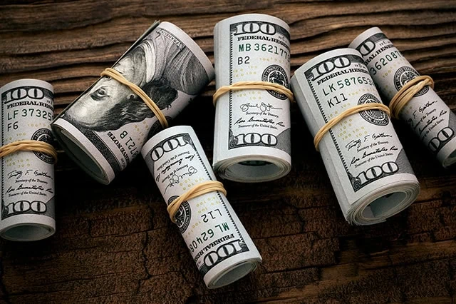 rolled cash dollars money dividends small