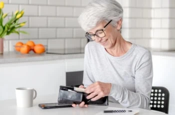 saving money budgeting senior wallet 1200