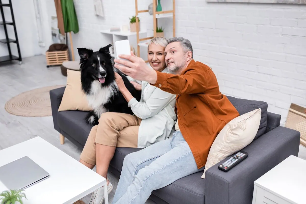 Aging, Reimagined: 10 Persistent Misconceptions About Aging 12 senior couple dog smart phone selfie 1200