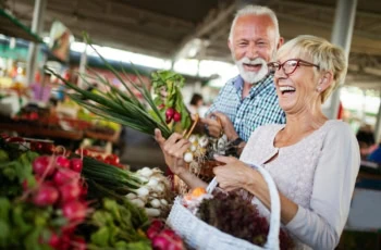 senior fresh groceries shopping basket vegetables