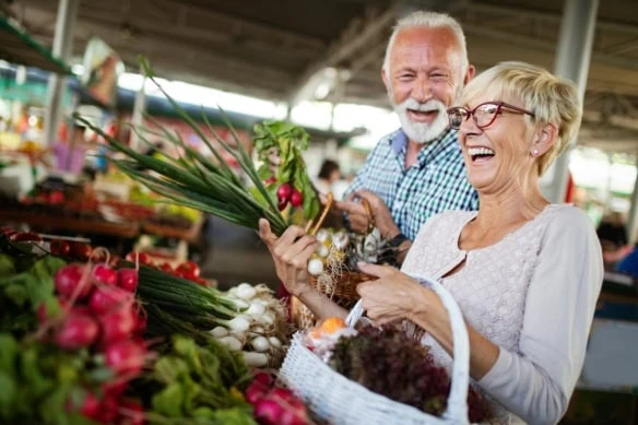senior fresh groceries shopping basket vegetables