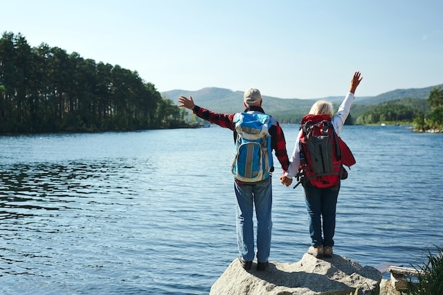 senior hiking walking lake