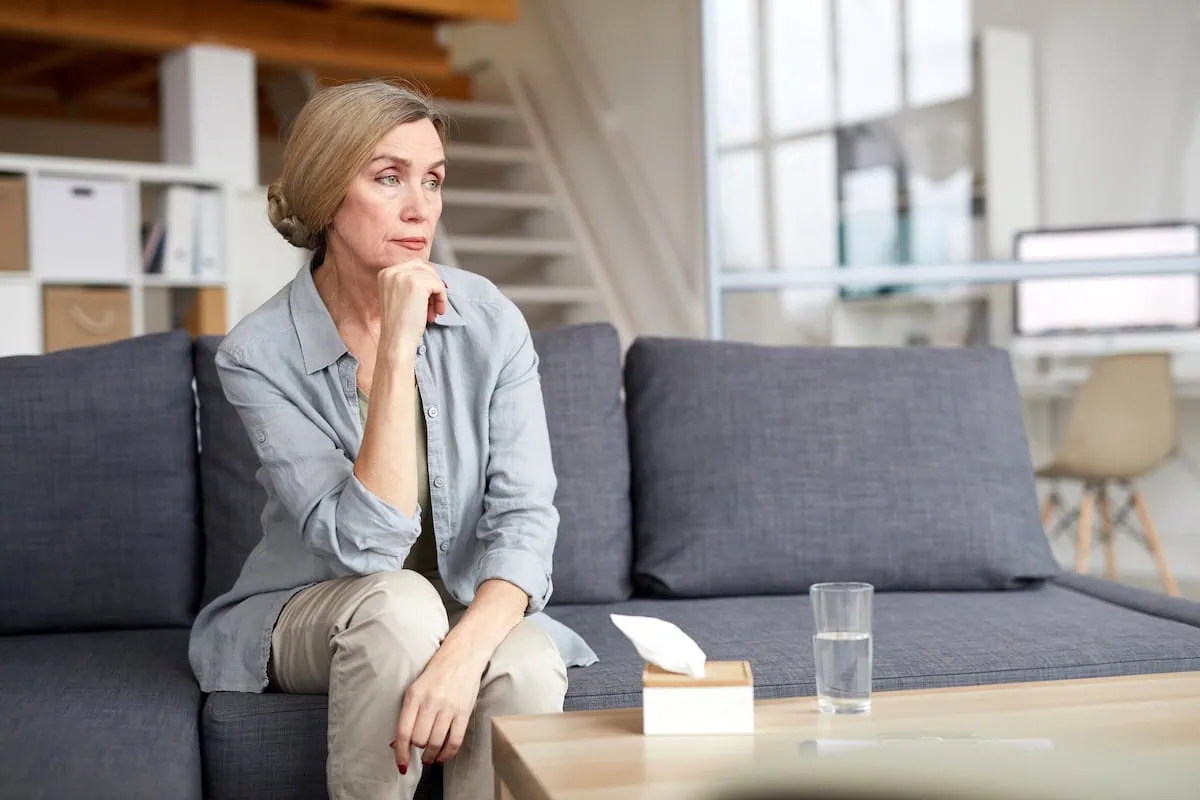 10 States Where Retirees Are Likely to Outlive Their Savings 2 senior short on retirement savings couch