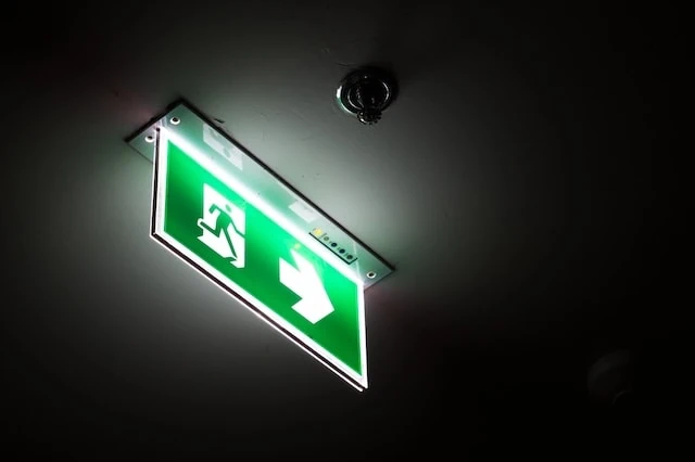 shrinking states emergency exit sign