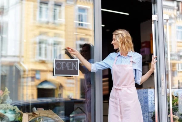small business owner woman open sign 1200