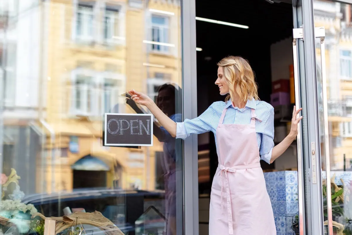 small business owner woman open sign 1200