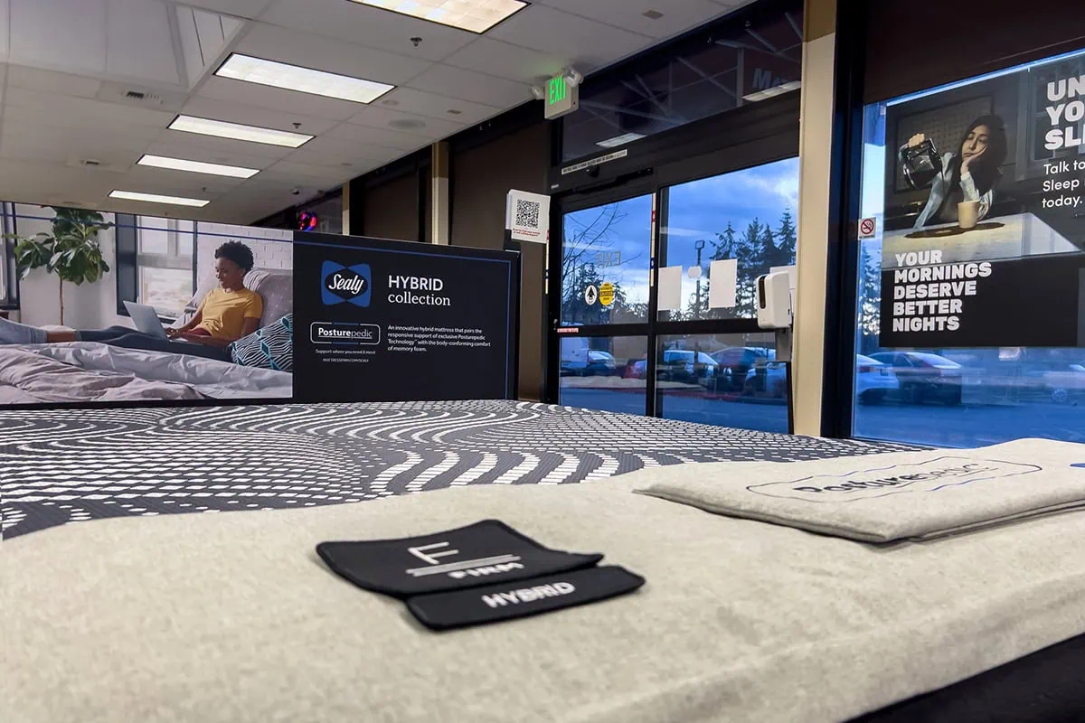 7 Best Growth Stocks for the Rest of 2026 18 A mattress store showing Sealy mattresses.