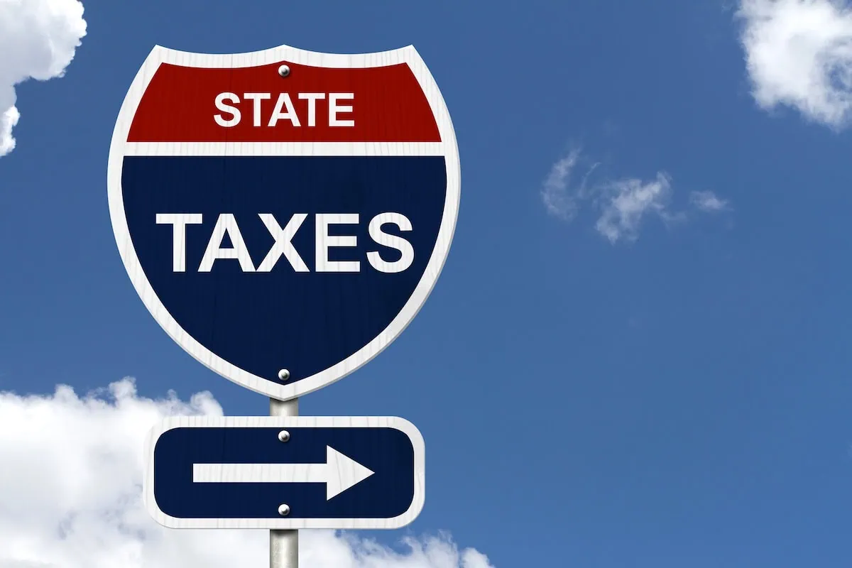 state taxes road sign with arrow 1200