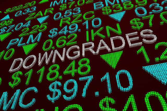 Pros Cut Meta Platforms (META) Stock Targets After Q2 Miss 2 concept art of a ticker board with the word downgrades.