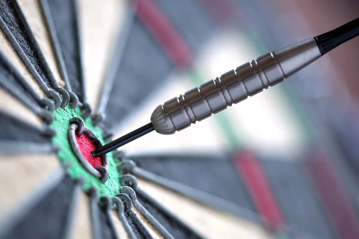 7 Mighty Mutual Funds for Investors New to Mutual Funds 6 a camera focuses on a dart hitting a bullseye.