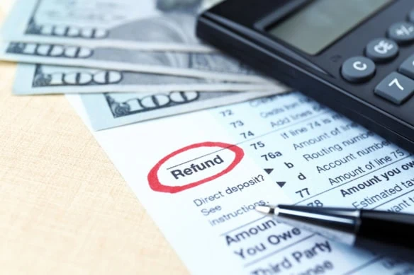the word refund is circled in red on a tax form.
