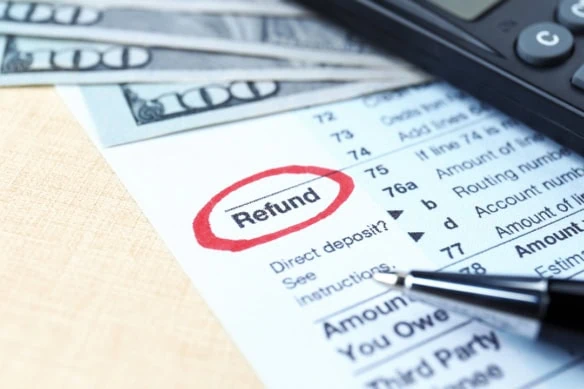 the word refund is circled in red on a tax form.