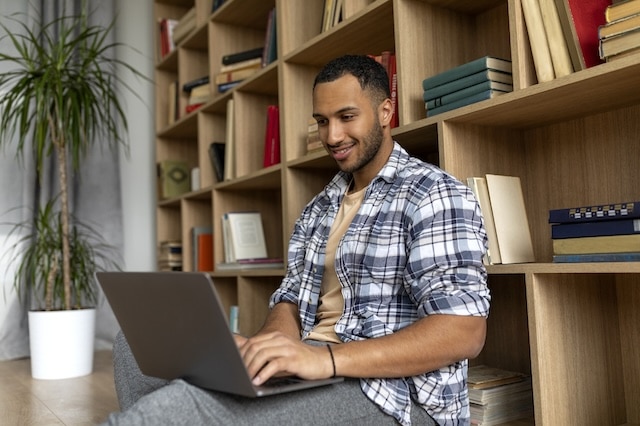 tax software laptop happy man