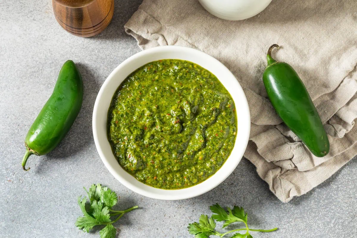 10 Trader Joe's Products That Make Your Guests Think You Went to Culinary School 3 trader joes zhough sauce cilantro jalapeno peppers 1200