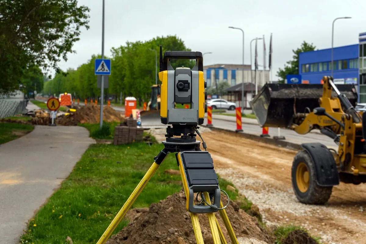 10 Best 'Rebound' Stocks to Buy for the Rest of 2026 5 A Trimble geodetic total station instrument.