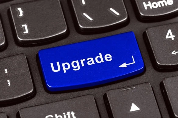 A keyboard key that reads upgrade.