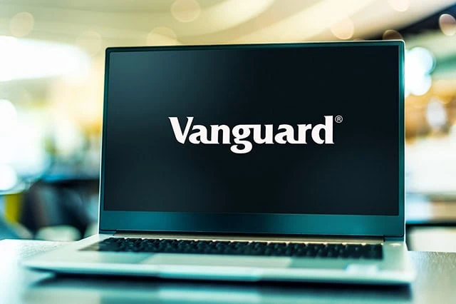 a laptop with the vanguard logo against a black screen.