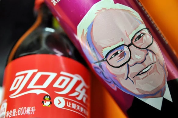 warren buffett's face on a coca-cola can.