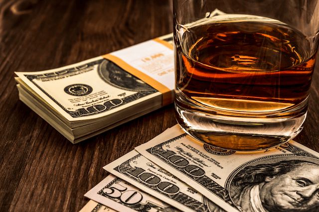 whiskey investment dollar bills