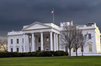 The White House in Washington, D.C., during a cloudy day.