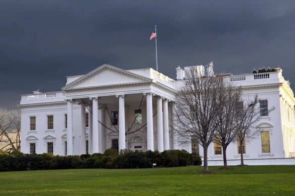 The White House in Washington, D.C., during a cloudy day.