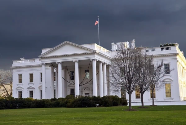 The White House in Washington, D.C., during a cloudy day.