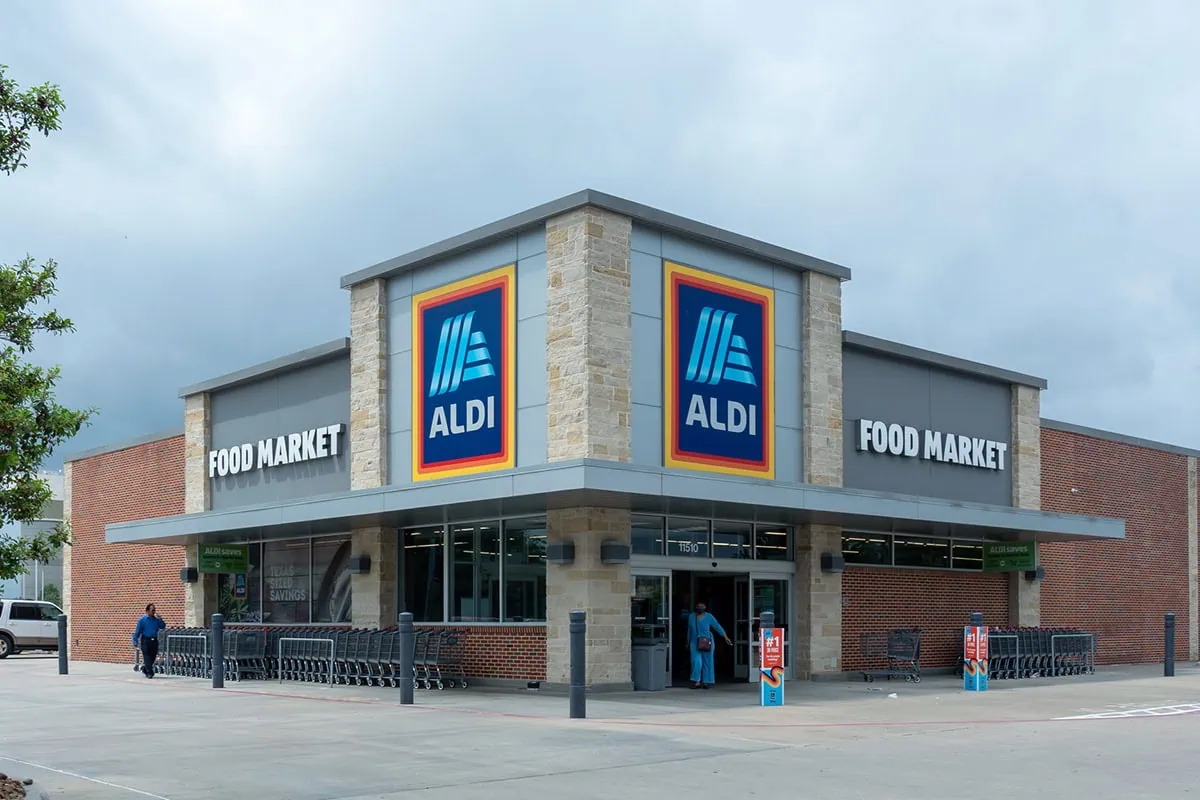 The 10 Aldi Commandments for an Affordable, Stress-Free Shopping Trip 2 a picture of the outside of a store belonging to whitestone reit tenant aldi.