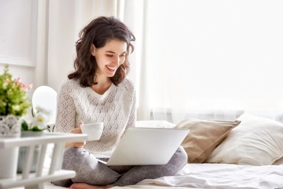 woman working on a laptop 1200