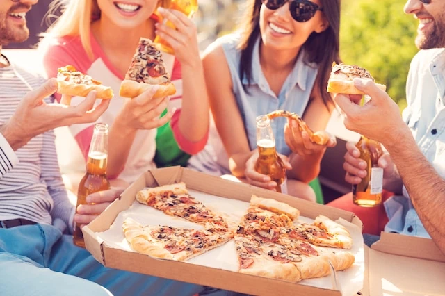 young people pizza party drinking alcohol