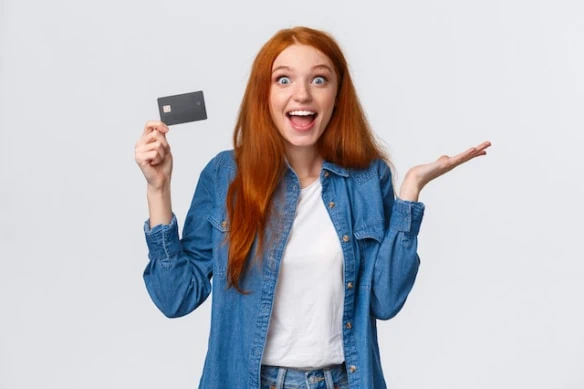 ๐ค Father + CPA Certified: The 7 Best Debit Cards for Teens 1 young woman credit debit card smiling white background