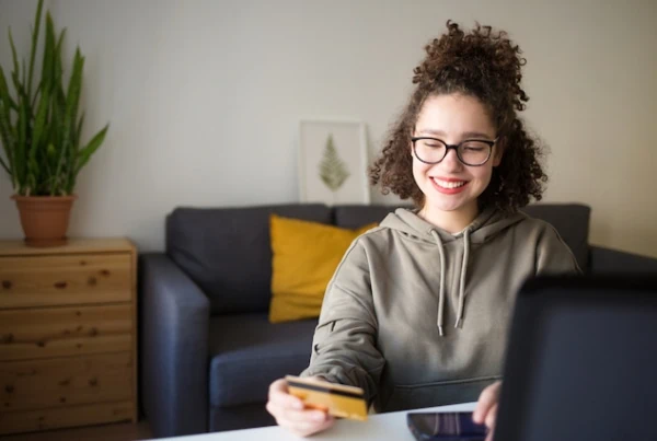 young woman teen credit card online bank account